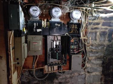 Before a completed electric panel professionals project in the  area