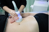 A person's stomach being treated with CryoSlimming